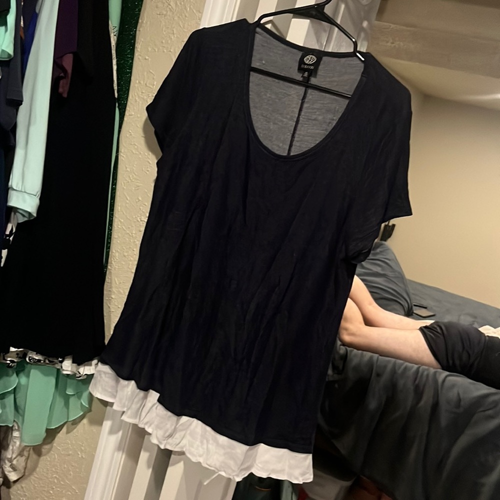 Blue shirt with button and white accent